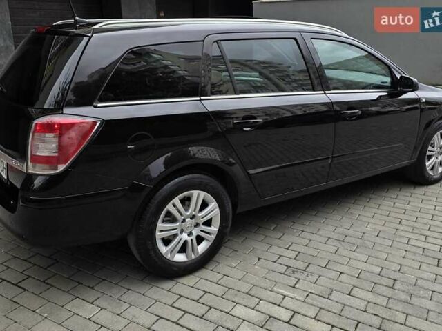 Черный Опель Астра, объемом двигателя 1.7 л и пробегом 224 тыс. км за 5650 $, фото 10 на Automoto.ua