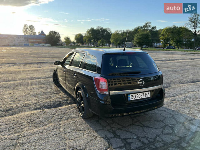 Черный Опель Астра, объемом двигателя 1.6 л и пробегом 261 тыс. км за 5600 $, фото 9 на Automoto.ua