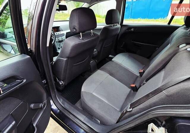 Черный Опель Астра, объемом двигателя 1.6 л и пробегом 238 тыс. км за 6299 $, фото 55 на Automoto.ua