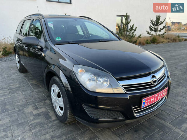 Черный Опель Астра, объемом двигателя 1.4 л и пробегом 242 тыс. км за 4450 $, фото 24 на Automoto.ua