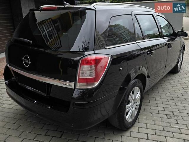 Черный Опель Астра, объемом двигателя 1.7 л и пробегом 224 тыс. км за 5650 $, фото 9 на Automoto.ua