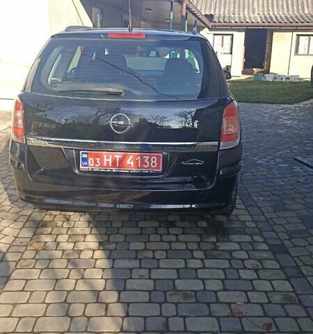 Черный Опель Астра, объемом двигателя 1.6 л и пробегом 249 тыс. км за 5650 $, фото 3 на Automoto.ua
