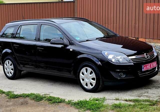 Черный Опель Астра, объемом двигателя 1.6 л и пробегом 238 тыс. км за 6299 $, фото 12 на Automoto.ua