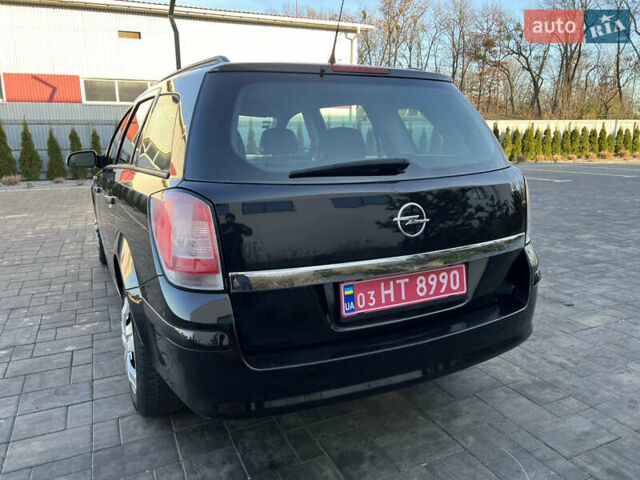 Черный Опель Астра, объемом двигателя 1.4 л и пробегом 242 тыс. км за 4450 $, фото 14 на Automoto.ua