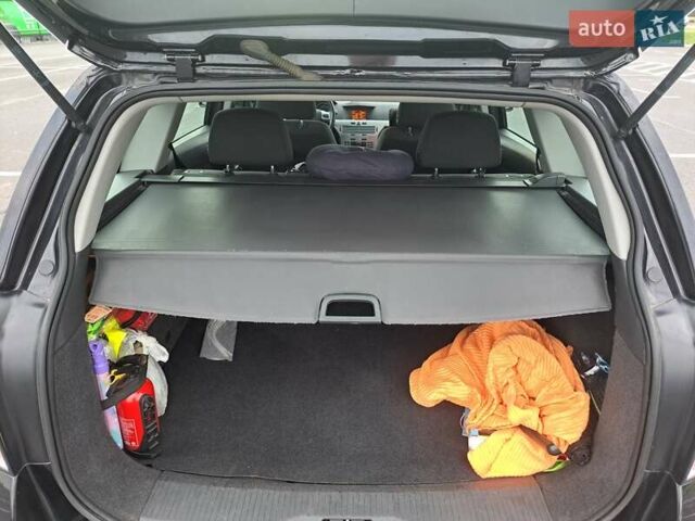 Черный Опель Астра, объемом двигателя 1.6 л и пробегом 212 тыс. км за 5200 $, фото 31 на Automoto.ua