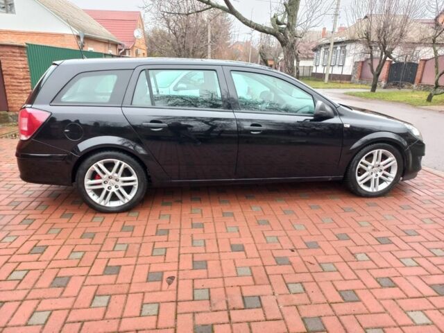 Черный Опель Астра, объемом двигателя 1.8 л и пробегом 200 тыс. км за 5750 $, фото 3 на Automoto.ua