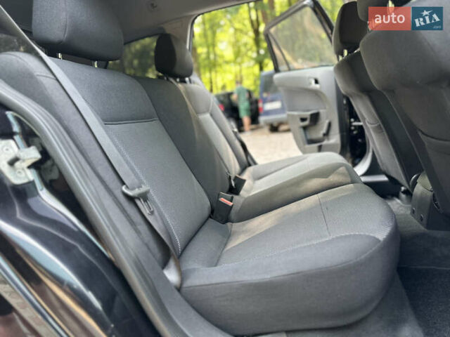 Черный Опель Астра, объемом двигателя 1.6 л и пробегом 157 тыс. км за 5499 $, фото 127 на Automoto.ua