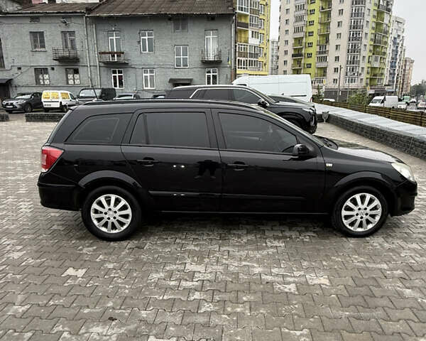 Черный Опель Астра, объемом двигателя 1.9 л и пробегом 255 тыс. км за 6200 $, фото 19 на Automoto.ua