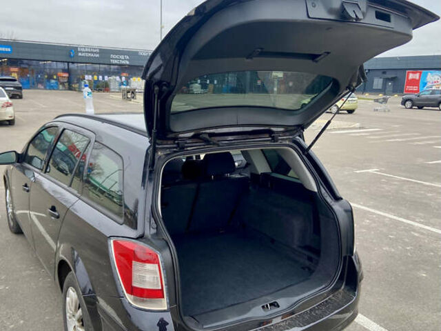 Черный Опель Астра, объемом двигателя 1.8 л и пробегом 200 тыс. км за 6999 $, фото 21 на Automoto.ua