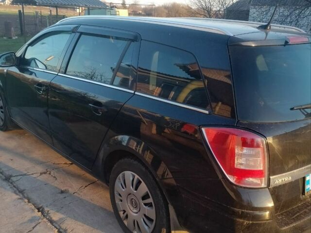 Черный Опель Астра, объемом двигателя 1.7 л и пробегом 190 тыс. км за 5200 $, фото 1 на Automoto.ua