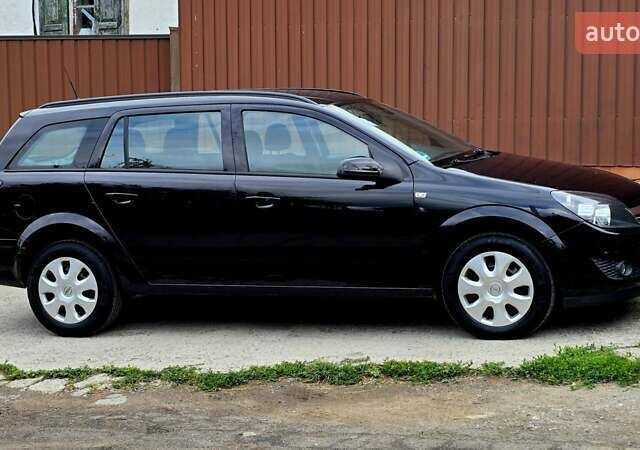 Черный Опель Астра, объемом двигателя 1.6 л и пробегом 238 тыс. км за 6299 $, фото 15 на Automoto.ua