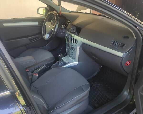 Черный Опель Астра, объемом двигателя 1.6 л и пробегом 205 тыс. км за 5700 $, фото 30 на Automoto.ua