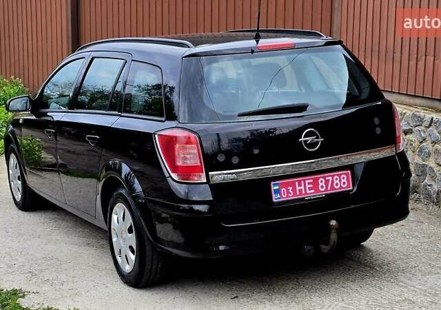 Черный Опель Астра, объемом двигателя 1.6 л и пробегом 238 тыс. км за 6299 $, фото 24 на Automoto.ua