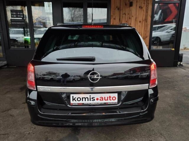 Черный Опель Астра, объемом двигателя 1.6 л и пробегом 247 тыс. км за 6299 $, фото 3 на Automoto.ua