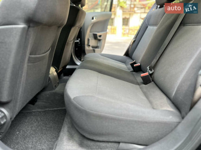 Черный Опель Астра, объемом двигателя 1.6 л и пробегом 157 тыс. км за 5499 $, фото 134 на Automoto.ua