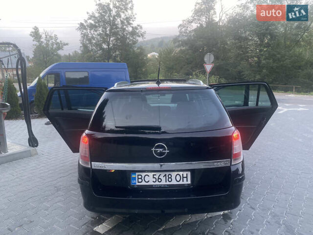 Черный Опель Астра, объемом двигателя 1.7 л и пробегом 224 тыс. км за 4700 $, фото 12 на Automoto.ua