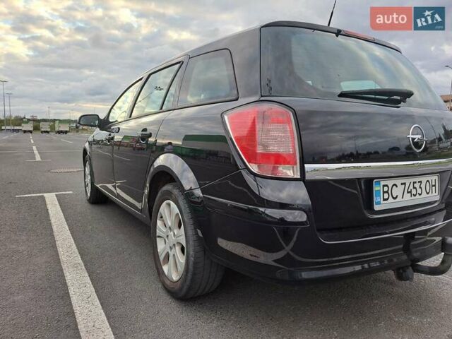 Черный Опель Астра, объемом двигателя 1.6 л и пробегом 212 тыс. км за 5200 $, фото 7 на Automoto.ua