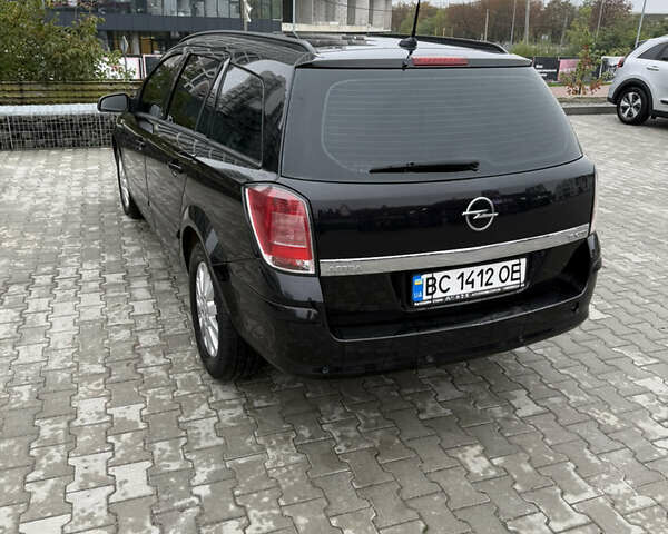 Черный Опель Астра, объемом двигателя 1.9 л и пробегом 255 тыс. км за 6200 $, фото 4 на Automoto.ua