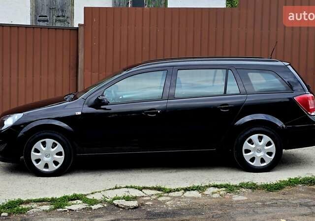 Черный Опель Астра, объемом двигателя 1.6 л и пробегом 238 тыс. км за 6299 $, фото 30 на Automoto.ua