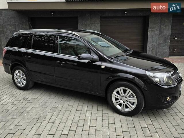 Черный Опель Астра, объемом двигателя 1.7 л и пробегом 224 тыс. км за 5650 $, фото 12 на Automoto.ua