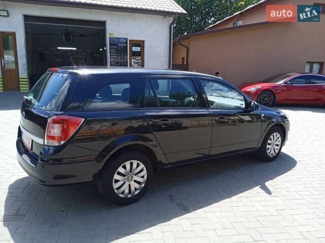 Черный Опель Астра, объемом двигателя 1.6 л и пробегом 178 тыс. км за 4900 $, фото 6 на Automoto.ua