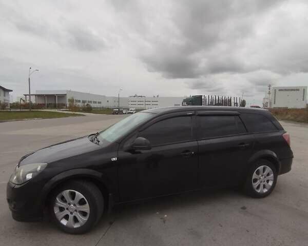 Черный Опель Астра, объемом двигателя 1.25 л и пробегом 325 тыс. км за 4699 $, фото 7 на Automoto.ua