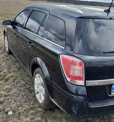 Черный Опель Астра, объемом двигателя 1.9 л и пробегом 266 тыс. км за 5550 $, фото 2 на Automoto.ua
