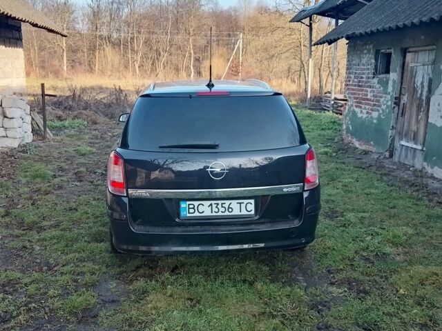Черный Опель Астра, объемом двигателя 1.7 л и пробегом 330 тыс. км за 4950 $, фото 3 на Automoto.ua