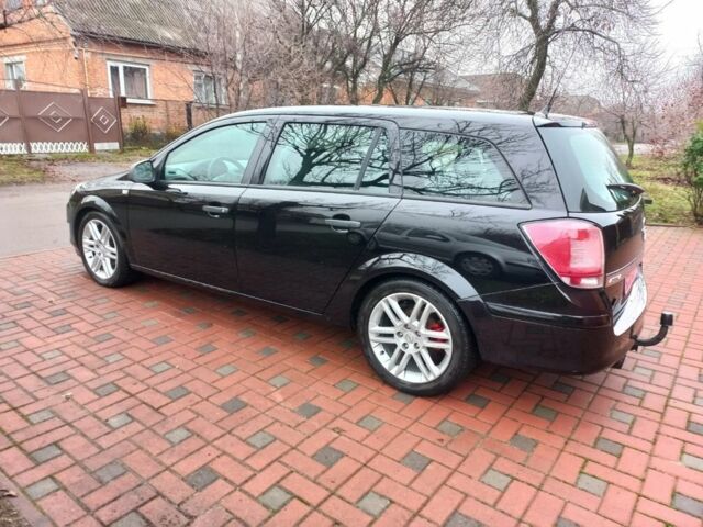 Черный Опель Астра, объемом двигателя 1.8 л и пробегом 200 тыс. км за 5750 $, фото 7 на Automoto.ua