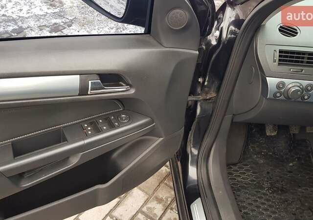 Черный Опель Астра, объемом двигателя 1.7 л и пробегом 332 тыс. км за 5599 $, фото 14 на Automoto.ua