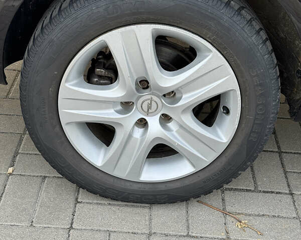 Черный Опель Астра, объемом двигателя 1.69 л и пробегом 223 тыс. км за 5900 $, фото 17 на Automoto.ua