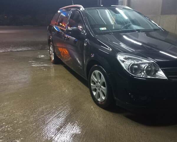 Черный Опель Астра, объемом двигателя 1.9 л и пробегом 266 тыс. км за 5550 $, фото 17 на Automoto.ua