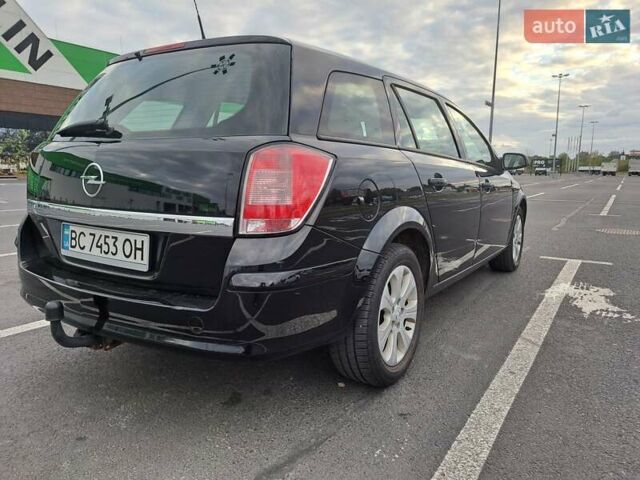 Черный Опель Астра, объемом двигателя 1.6 л и пробегом 212 тыс. км за 5200 $, фото 12 на Automoto.ua