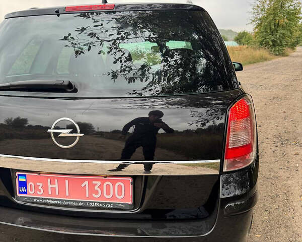 Черный Опель Астра, объемом двигателя 1.6 л и пробегом 230 тыс. км за 5750 $, фото 26 на Automoto.ua