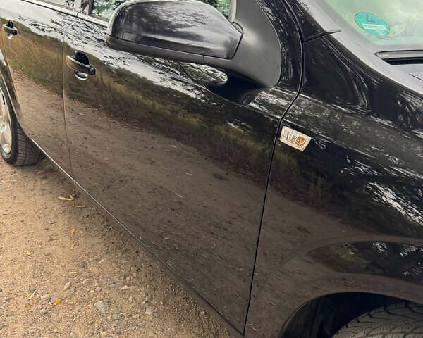 Черный Опель Астра, объемом двигателя 1.6 л и пробегом 230 тыс. км за 5750 $, фото 15 на Automoto.ua