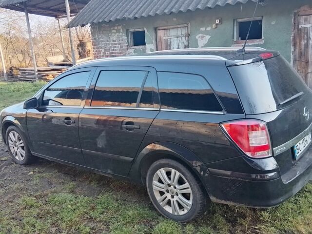 Черный Опель Астра, объемом двигателя 1.7 л и пробегом 330 тыс. км за 4950 $, фото 2 на Automoto.ua