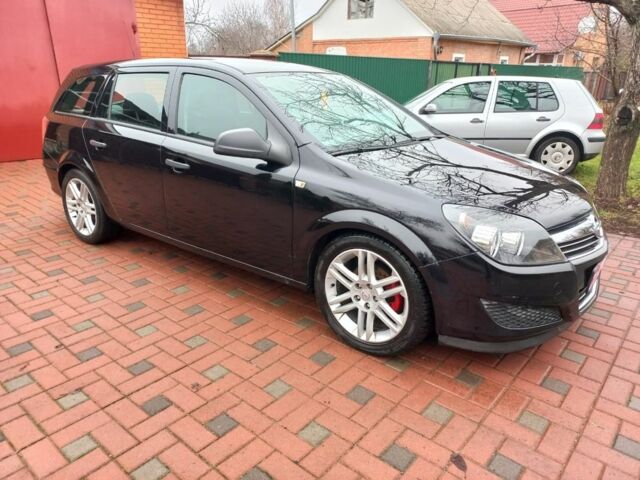 Черный Опель Астра, объемом двигателя 1.8 л и пробегом 200 тыс. км за 5750 $, фото 2 на Automoto.ua