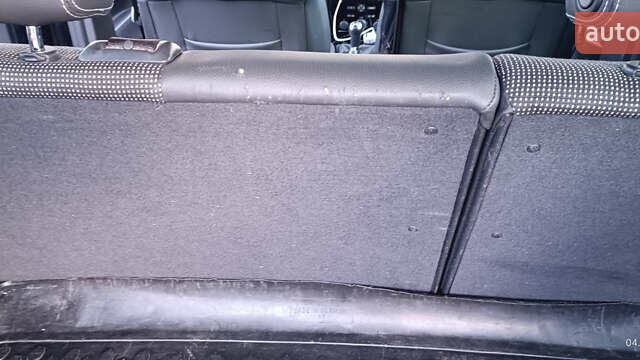 Черный Опель Астра, объемом двигателя 1.69 л и пробегом 268 тыс. км за 8000 $, фото 10 на Automoto.ua