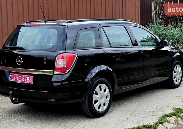 Черный Опель Астра, объемом двигателя 1.6 л и пробегом 238 тыс. км за 6299 $, фото 19 на Automoto.ua