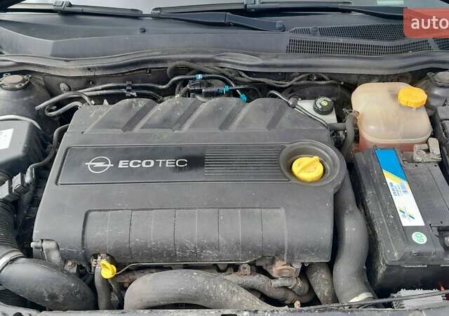 Черный Опель Астра, объемом двигателя 1.9 л и пробегом 266 тыс. км за 5550 $, фото 12 на Automoto.ua