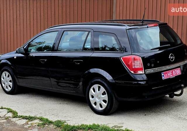 Черный Опель Астра, объемом двигателя 1.6 л и пробегом 238 тыс. км за 6299 $, фото 27 на Automoto.ua