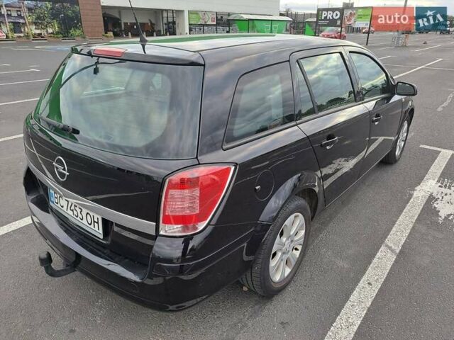 Черный Опель Астра, объемом двигателя 1.6 л и пробегом 212 тыс. км за 5200 $, фото 11 на Automoto.ua