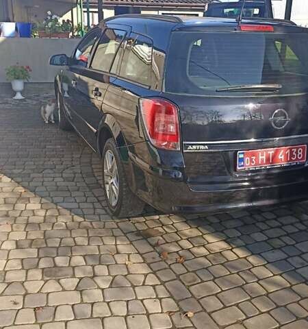 Черный Опель Астра, объемом двигателя 1.6 л и пробегом 249 тыс. км за 5650 $, фото 2 на Automoto.ua