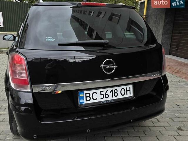 Черный Опель Астра, объемом двигателя 1.7 л и пробегом 224 тыс. км за 5599 $, фото 7 на Automoto.ua