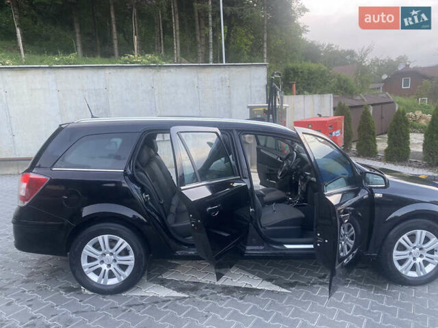 Черный Опель Астра, объемом двигателя 1.7 л и пробегом 224 тыс. км за 4700 $, фото 14 на Automoto.ua