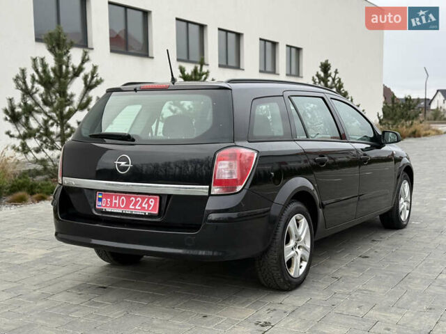 Черный Опель Астра, объемом двигателя 1.6 л и пробегом 215 тыс. км за 5350 $, фото 10 на Automoto.ua