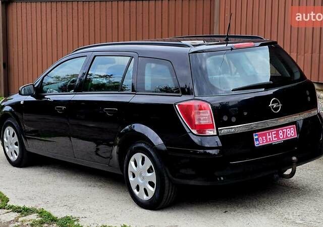 Черный Опель Астра, объемом двигателя 1.6 л и пробегом 238 тыс. км за 6299 $, фото 26 на Automoto.ua