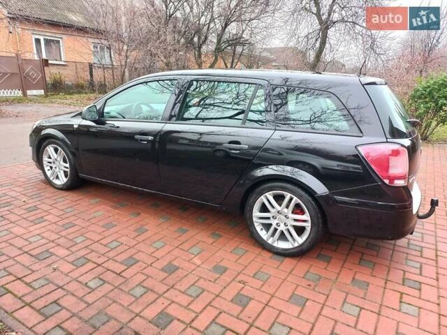 Чорний Опель Астра, об'ємом двигуна 1.8 л та пробігом 200 тис. км за 5750 $, фото 34 на Automoto.ua