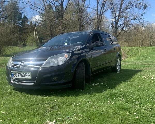 Черный Опель Астра, объемом двигателя 1.69 л и пробегом 250 тыс. км за 6500 $, фото 4 на Automoto.ua