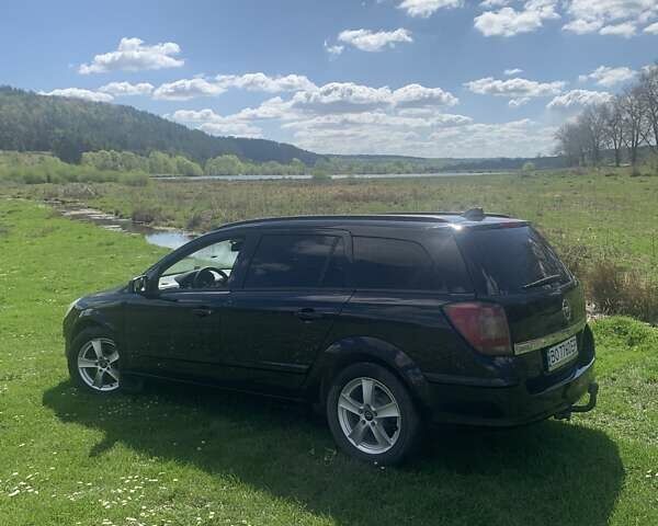 Черный Опель Астра, объемом двигателя 1.69 л и пробегом 250 тыс. км за 6500 $, фото 7 на Automoto.ua